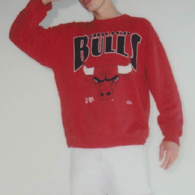 model wearing vintage chicago bulls sweatshirt