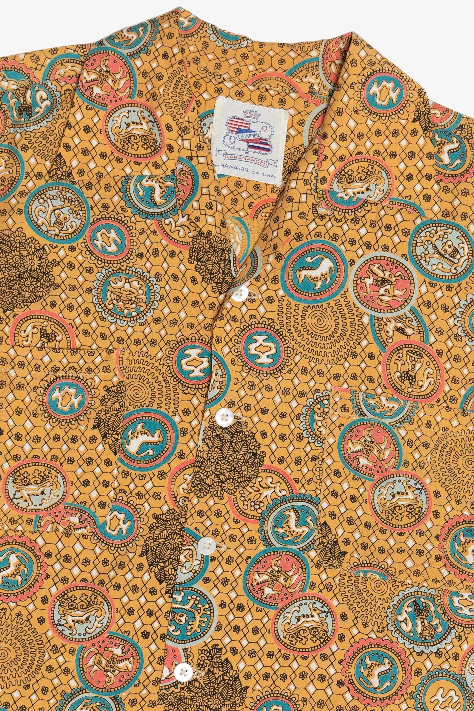 Patterned shirt with a visible brand label on a yellow background