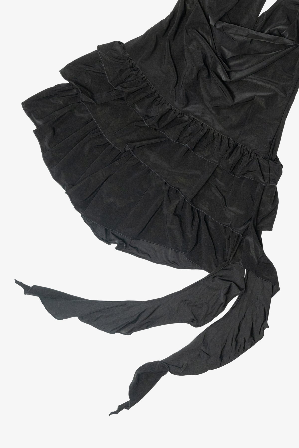 Black halter mini dress with tiered ruffle skirt and long draped ties