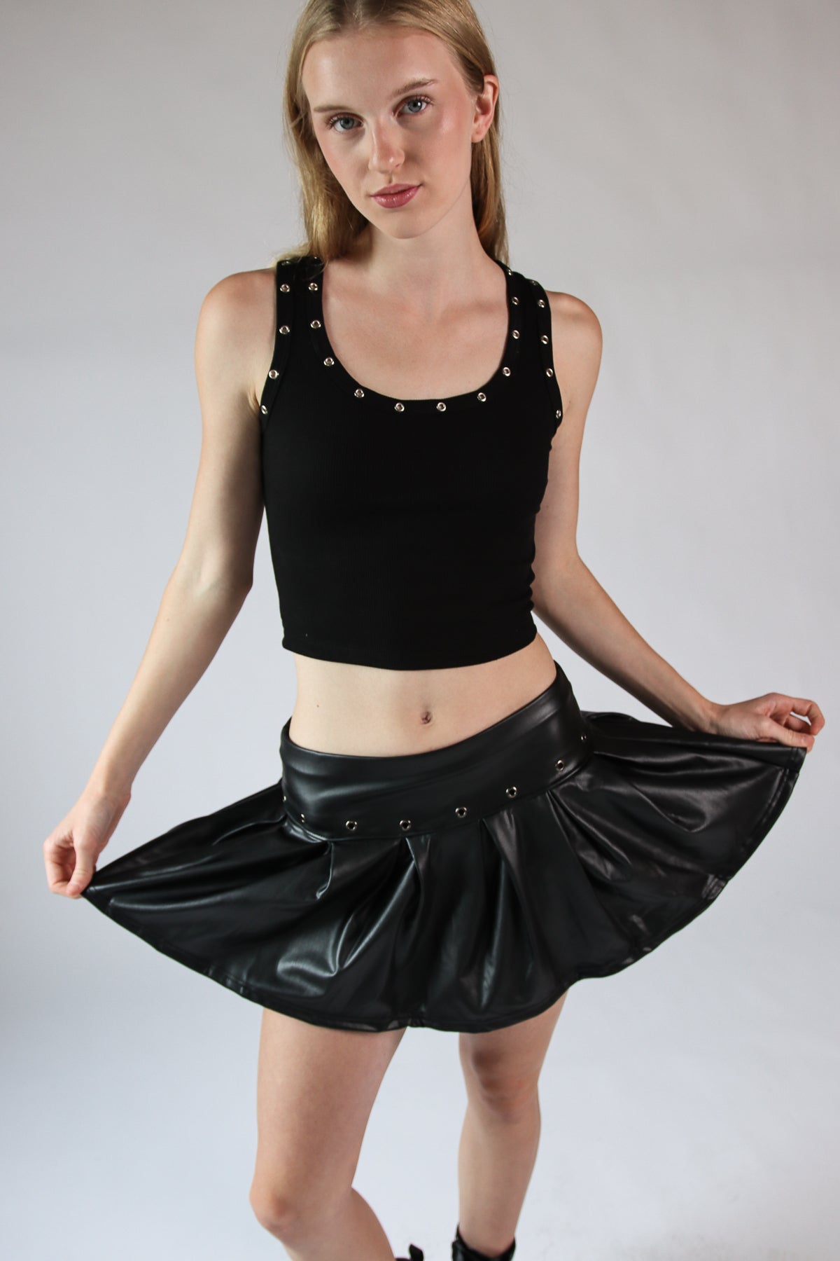 Pleated Faux Leather Eyelet Skort