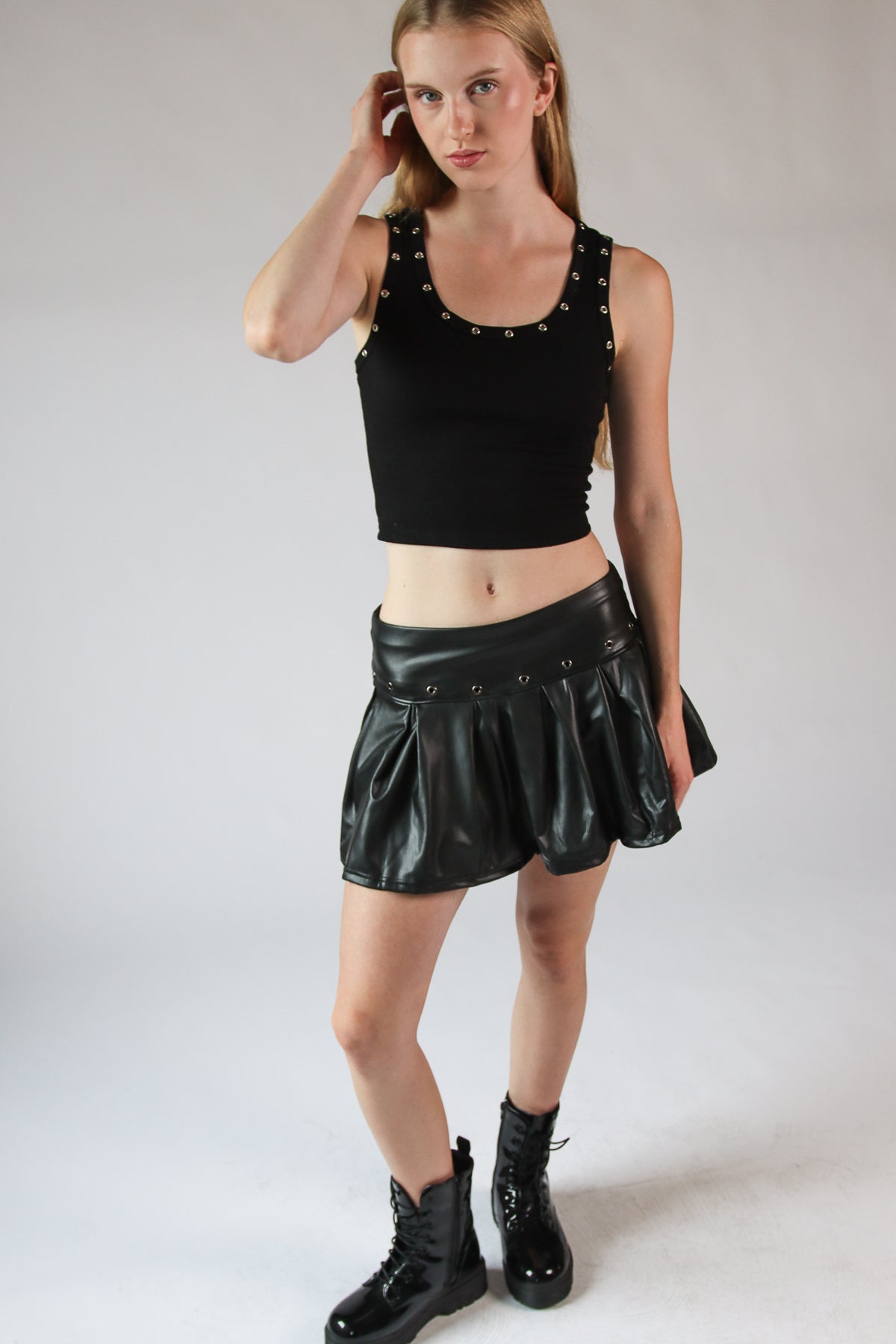 Pleated Faux Leather Eyelet Skort