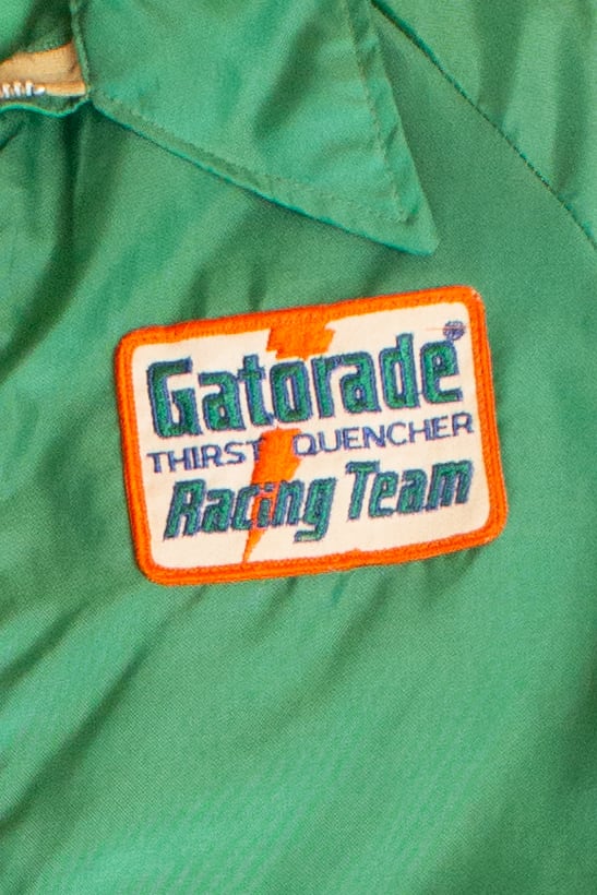 Gatorade racing team patch on a green jacket