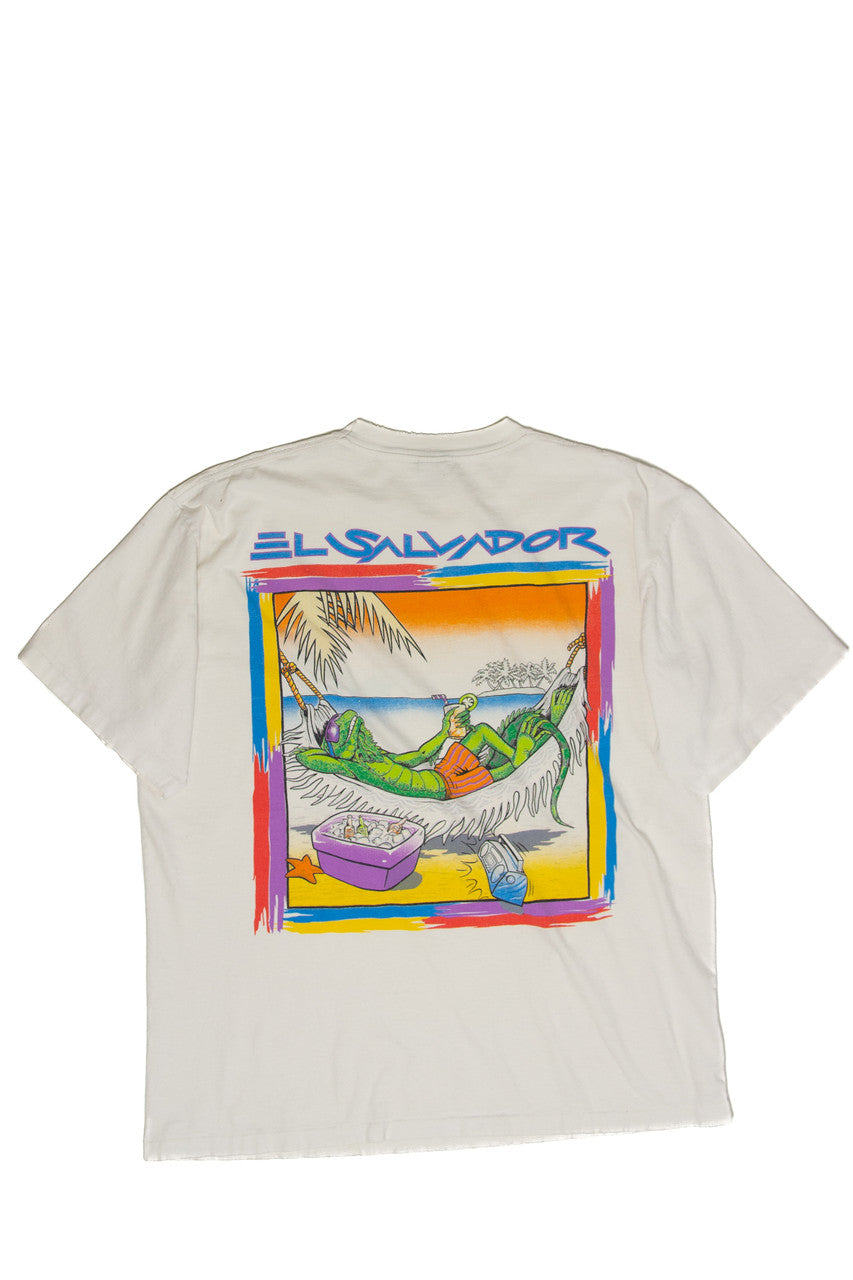 Vintage style white t-shirt with colorful El Salvador lizard lounging on hammock beach design on back