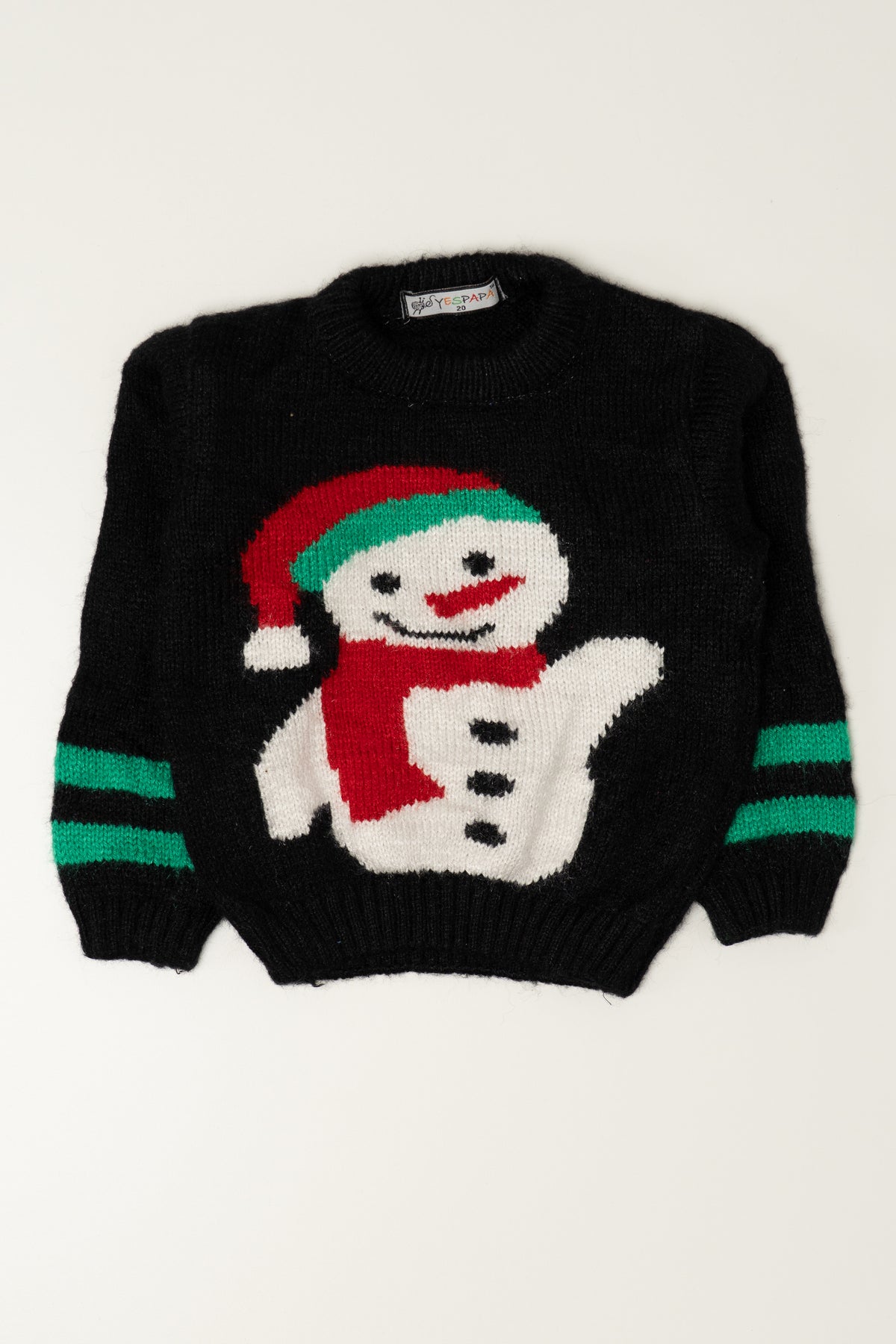 Black knit holiday sweater featuring a waving snowman wearing a red Santa hat and scarf