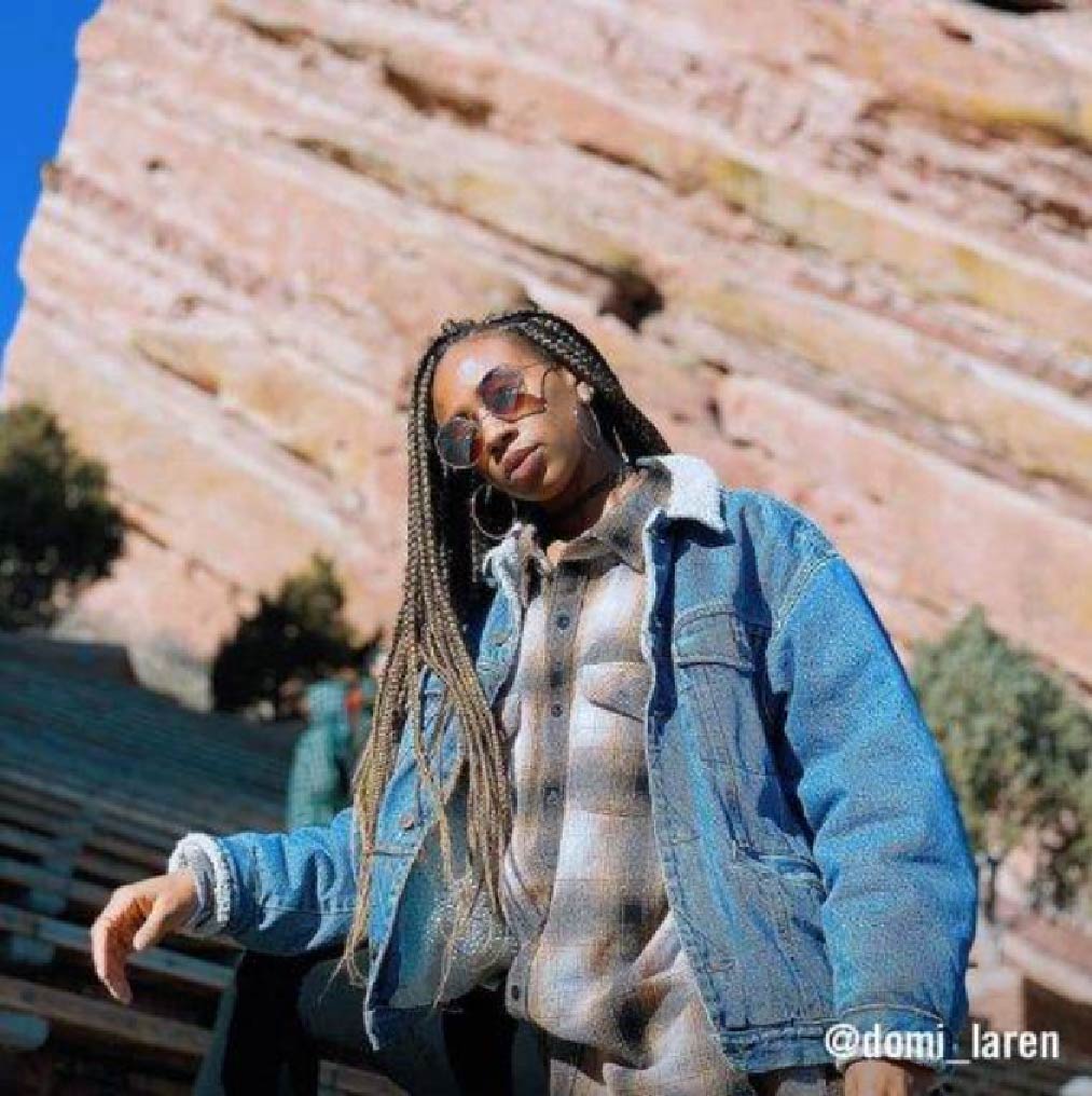 @domi_lauren rocking a layered look with a flannel and a sherpa-lined denim jacket hiking outside–the perfect cozy 90's look.