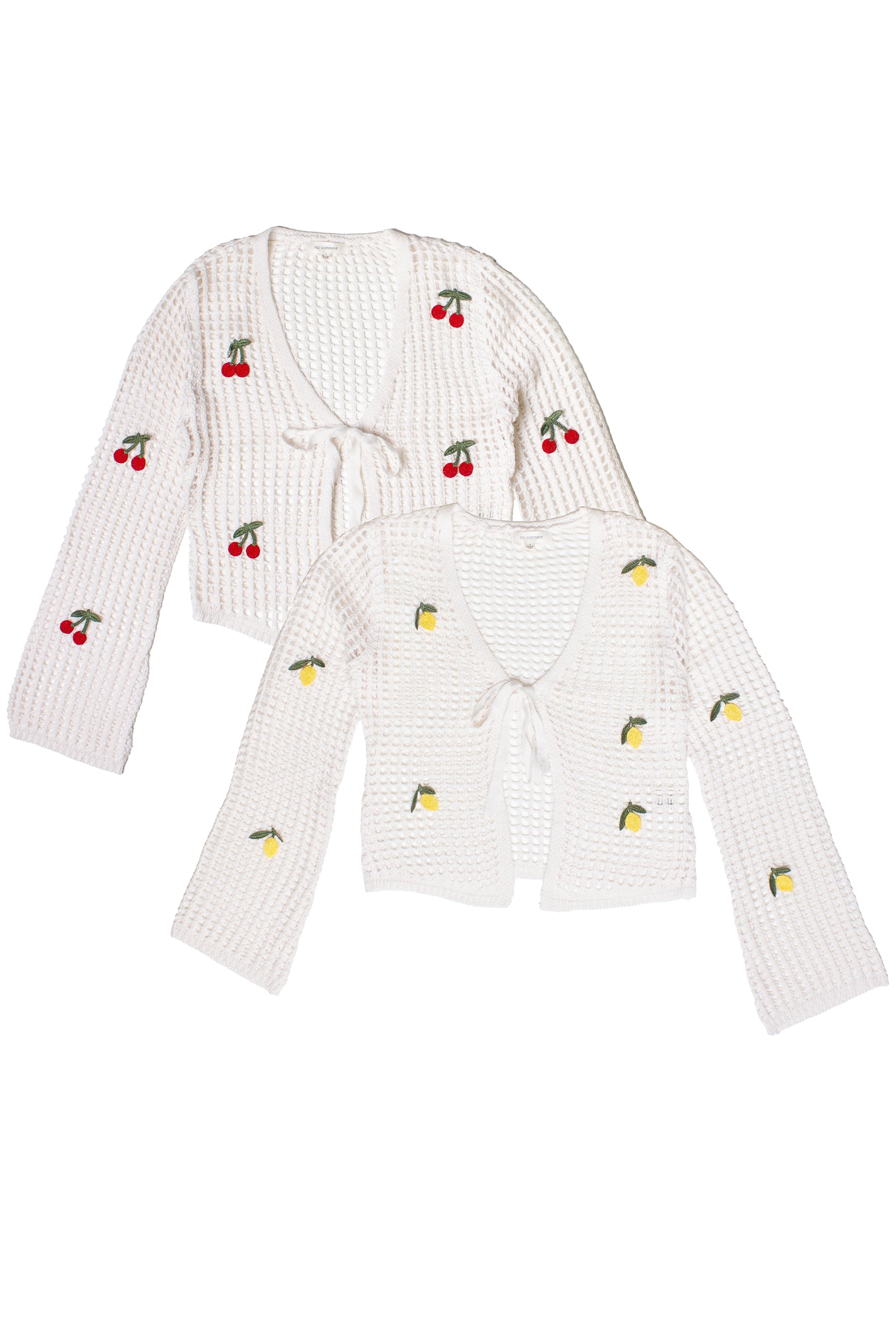 Two mesh stitch tie front cardigans, one with cherry and one with lemon fruit embroidery on white knit fabric