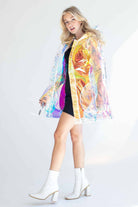 Woman wearing iridescent holographic jacket