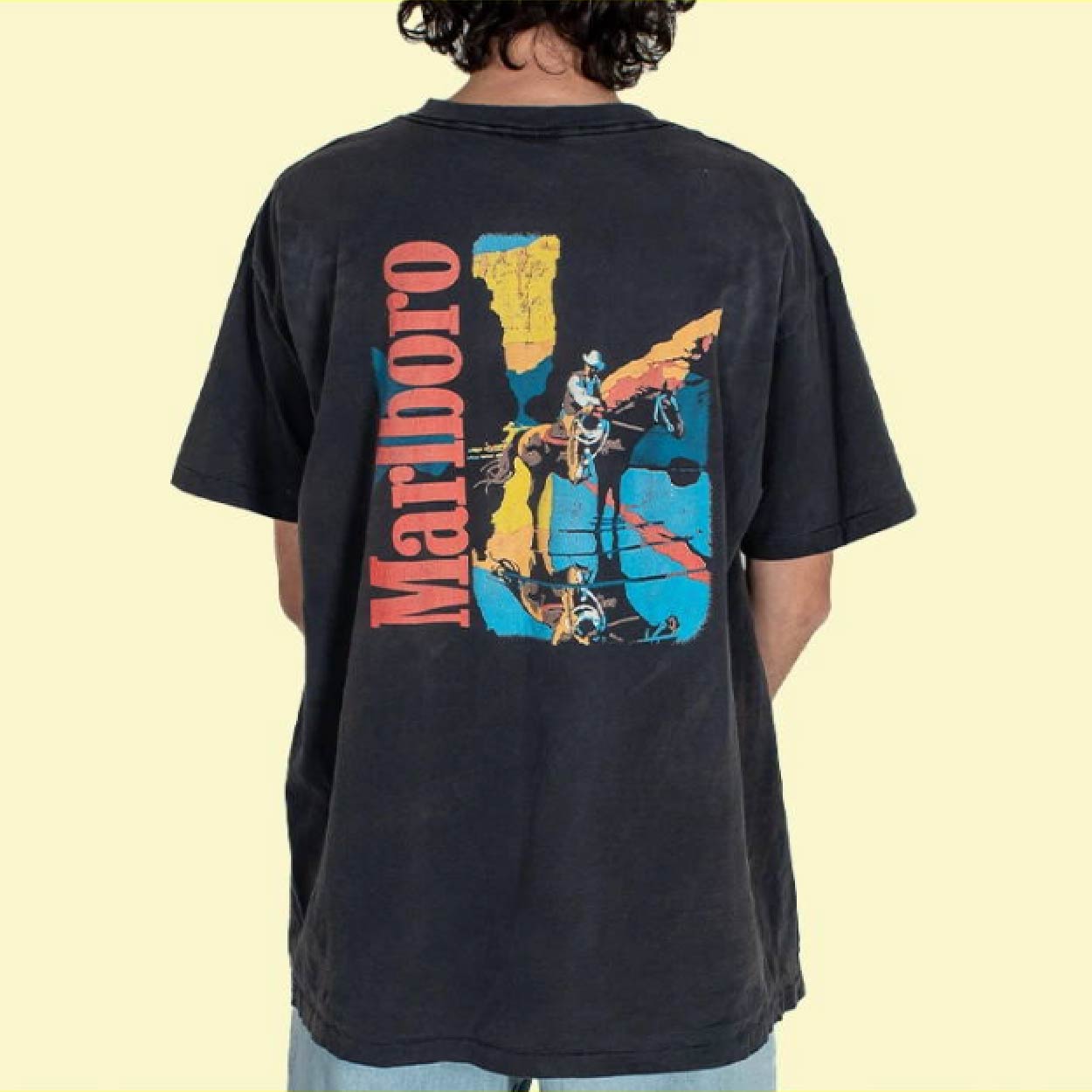Black Marlboro graphic tee featuring cowboy artwork–oversized 90's fit.