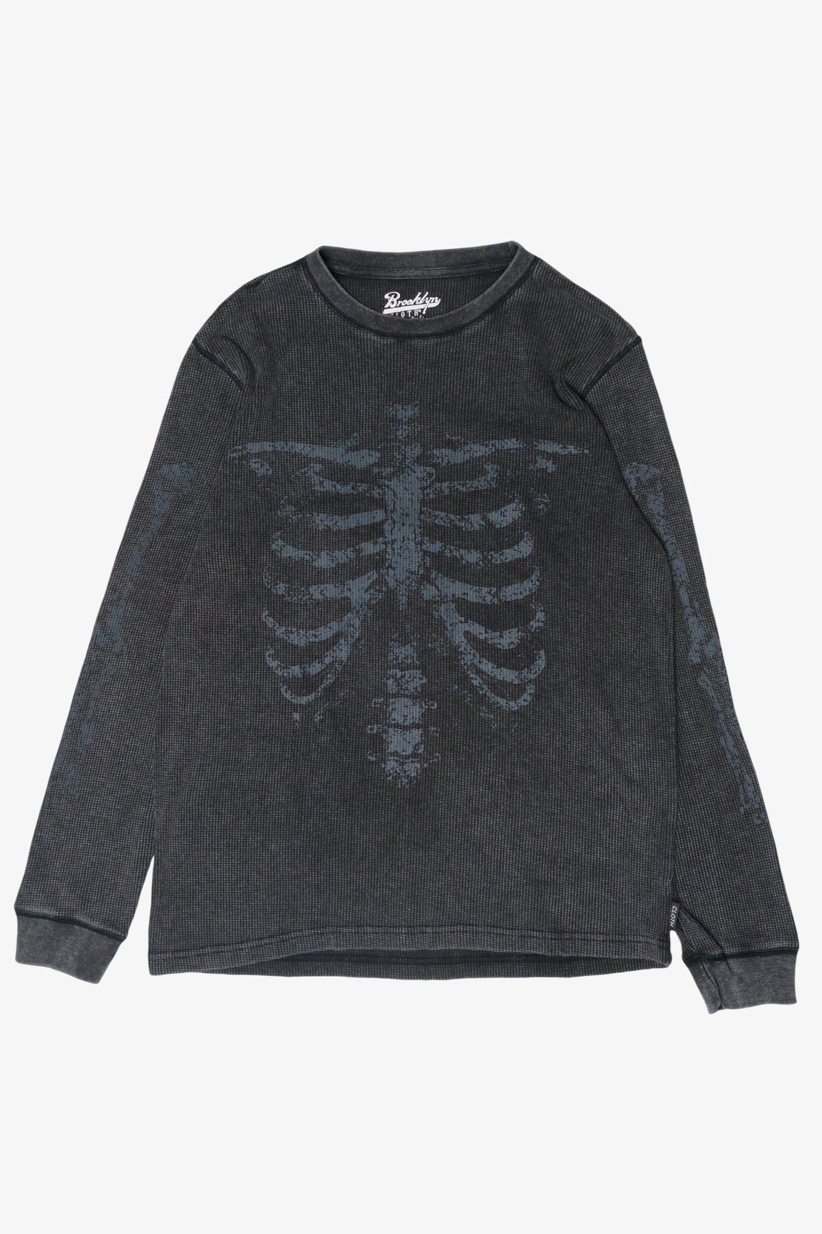Dark washed gray waffle knit long-sleeve shirt featuring a faded skeleton graphic across the chest and arms