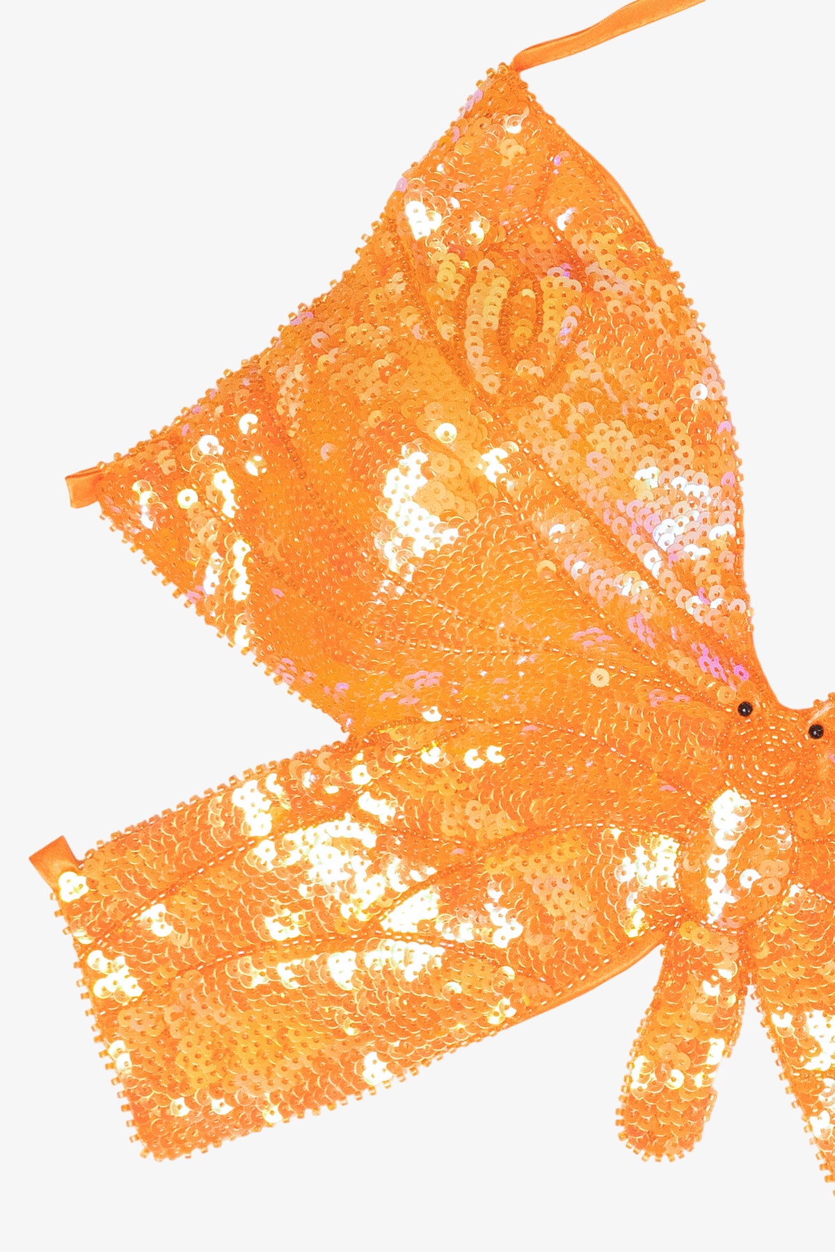 Bright orange sequin butterfly-shaped halter crop top detail