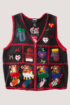Vintage black Christmas sweater vest with colorful holiday-themed appliques including mittens, hearts, and teddy bears in stockings