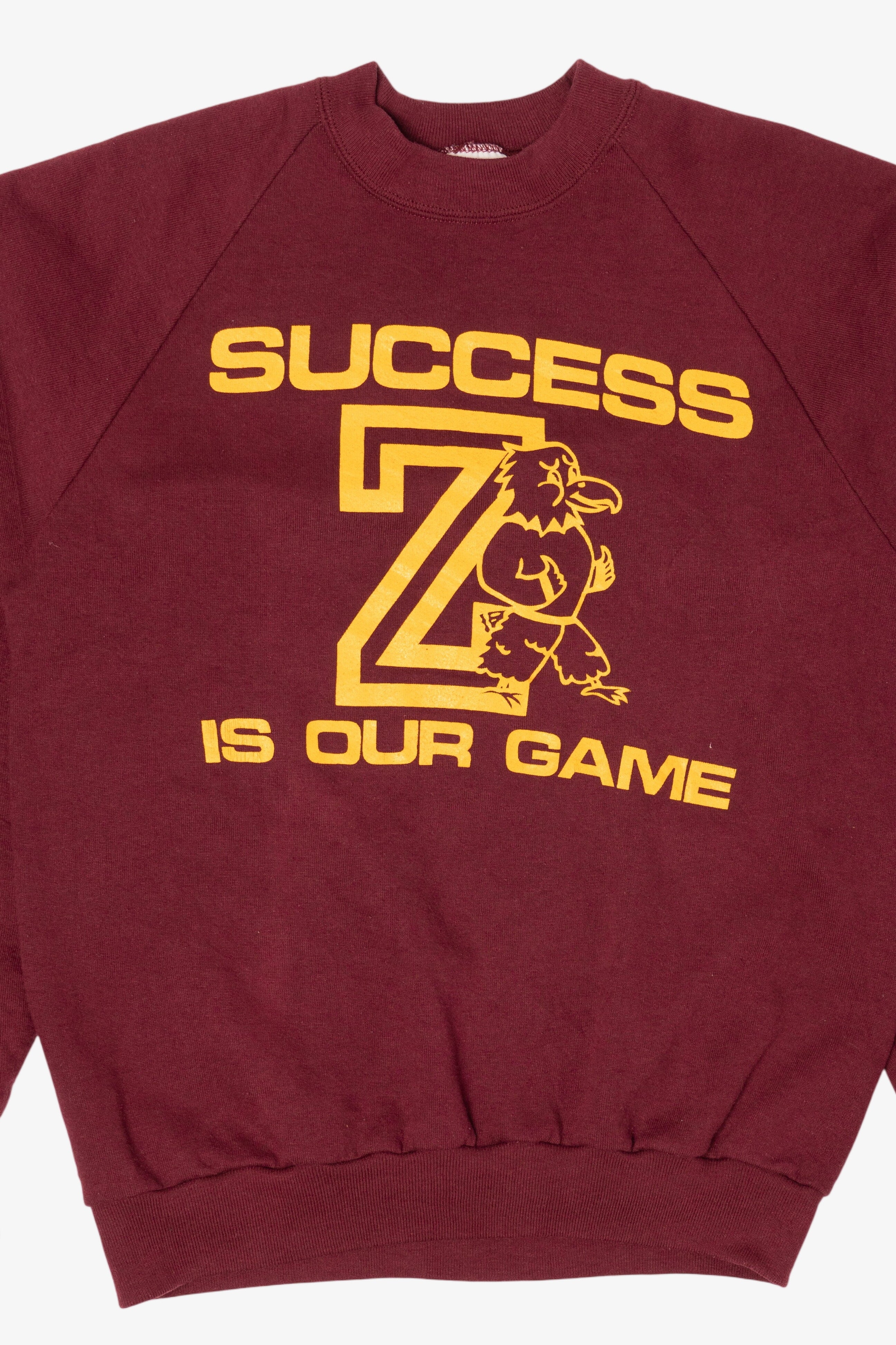 Vintage Burgundy "Success Is Our Game" Raglan Sweatshirt (1990s)