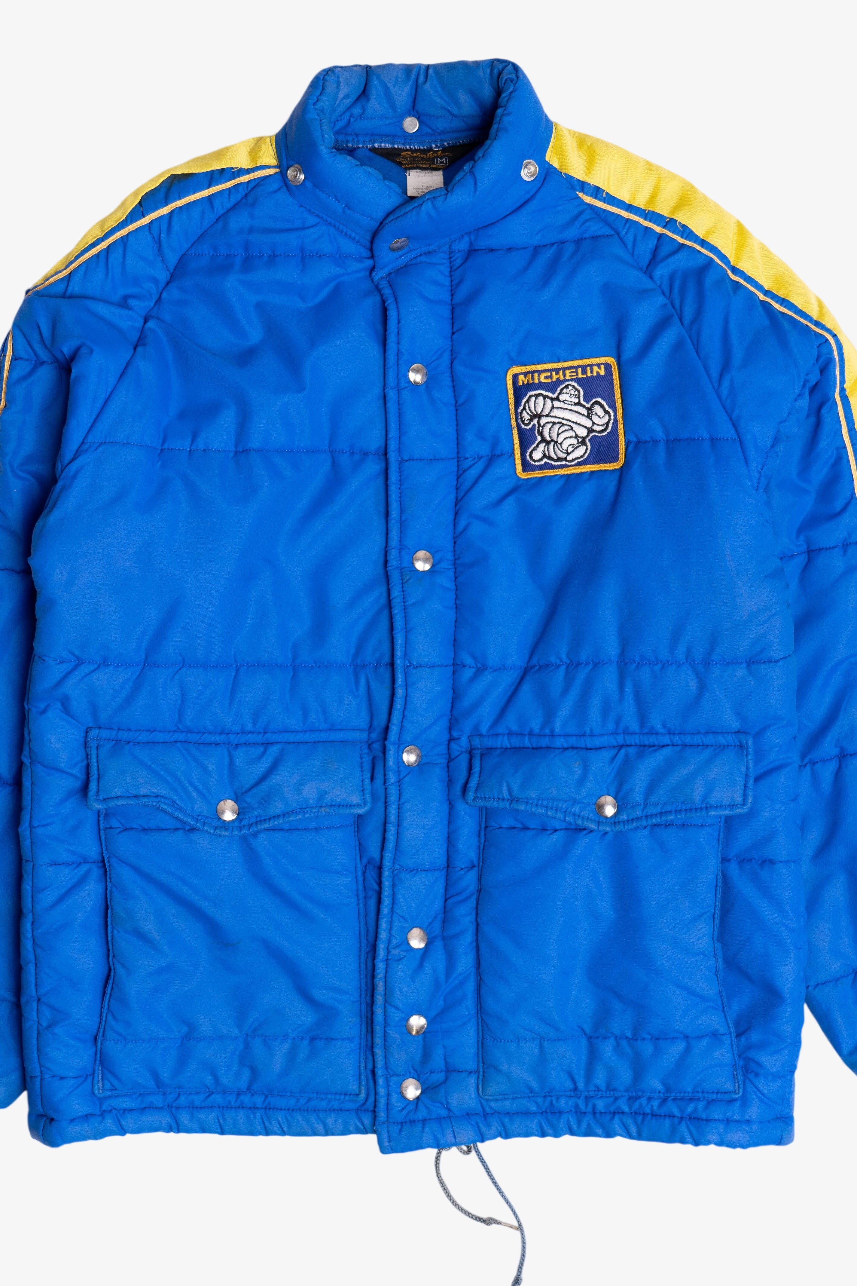 Vintage Swingster Michelin Man Patch Sleeve Spellout Puffer Jacket (1980s)