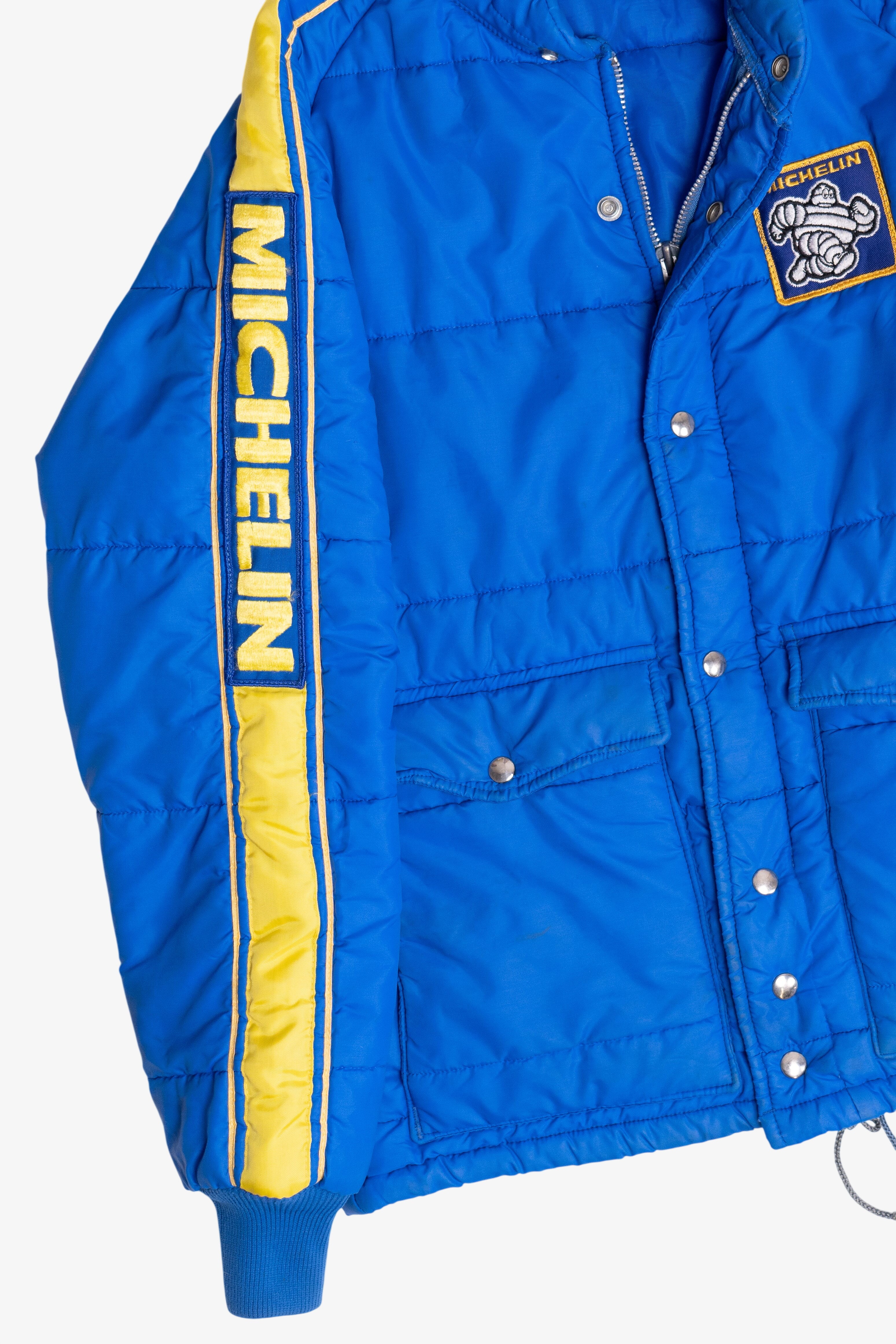 Vintage Swingster Michelin Man Patch Sleeve Spellout Puffer Jacket (1980s)