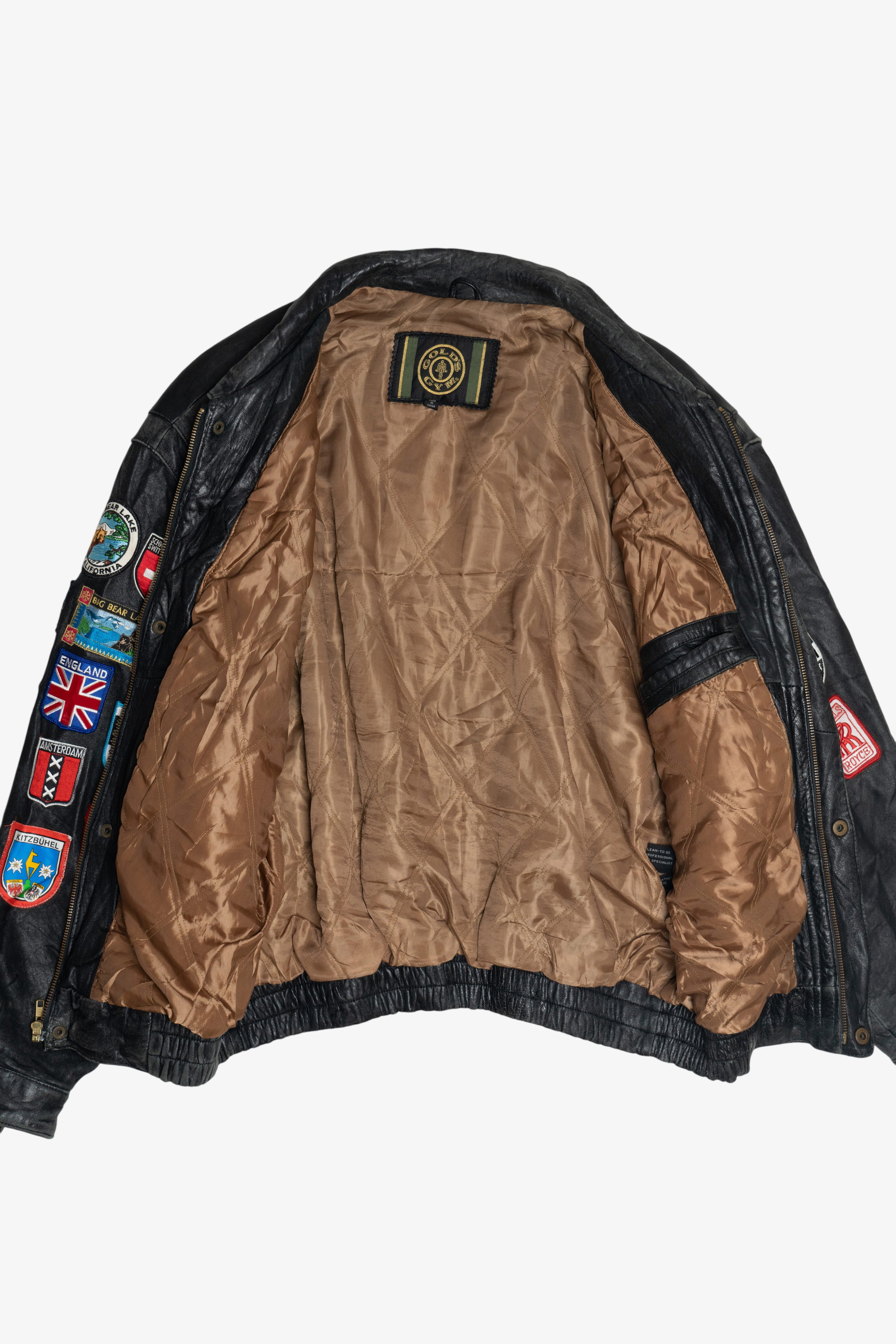 Vintage Distressed Gold's Gym Embroidered Leather Jacket With Car & Travel Patches (1990s)