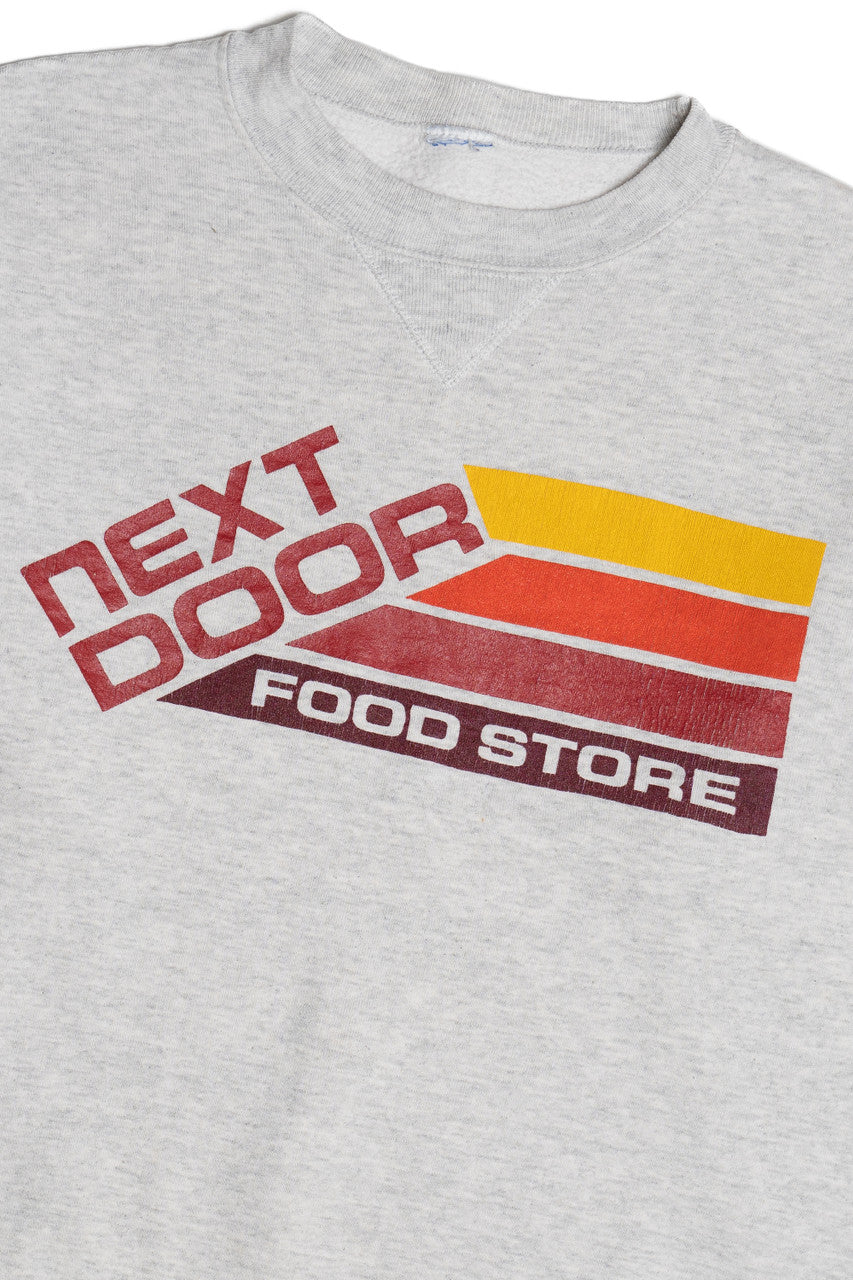 Vintage "Next Door Food Store" Sweatshirt (1990s)