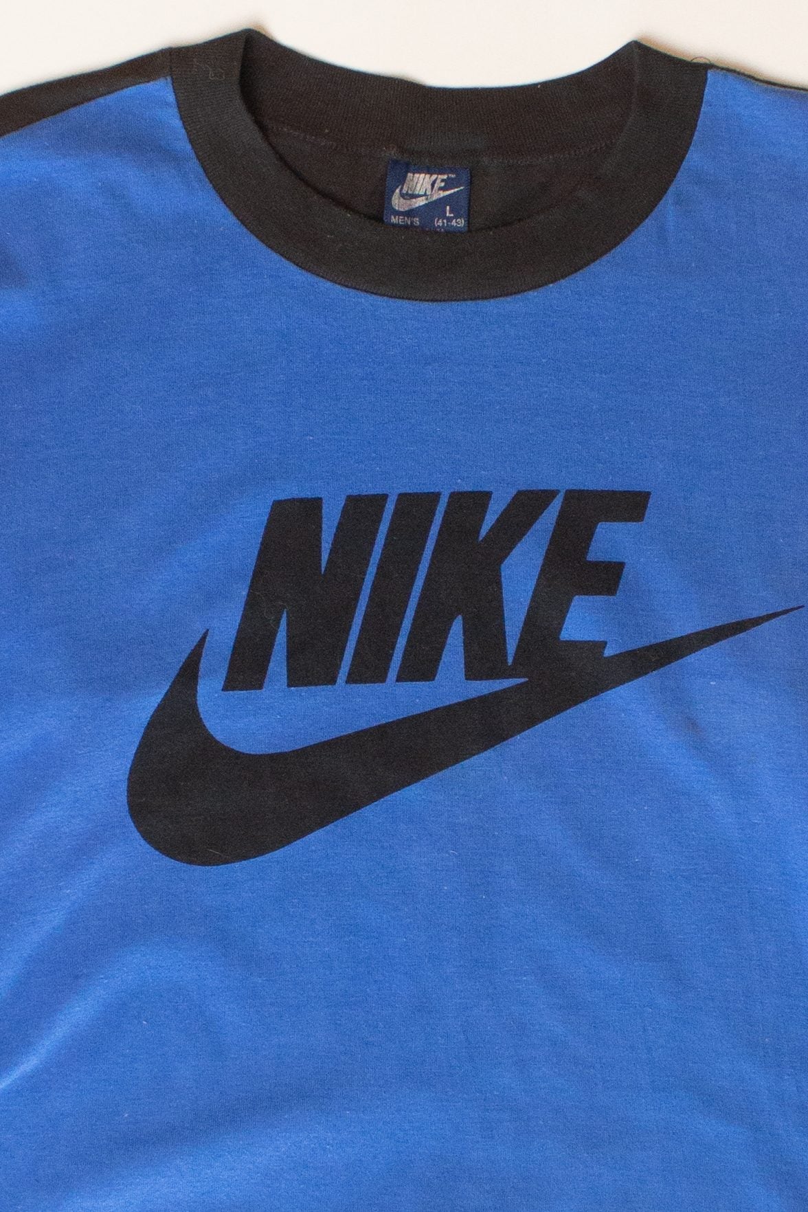 Vintage Black & Blue Cropped Nike T-Shirt (1980s)