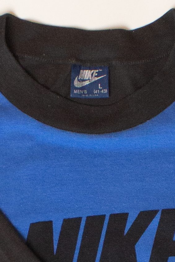 Vintage Black & Blue Cropped Nike T-Shirt (1980s)