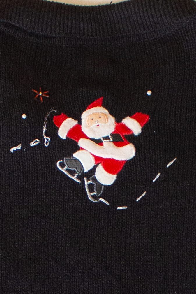 Vintage Skating Santas Ugly Christmas Cardigan (1990s)