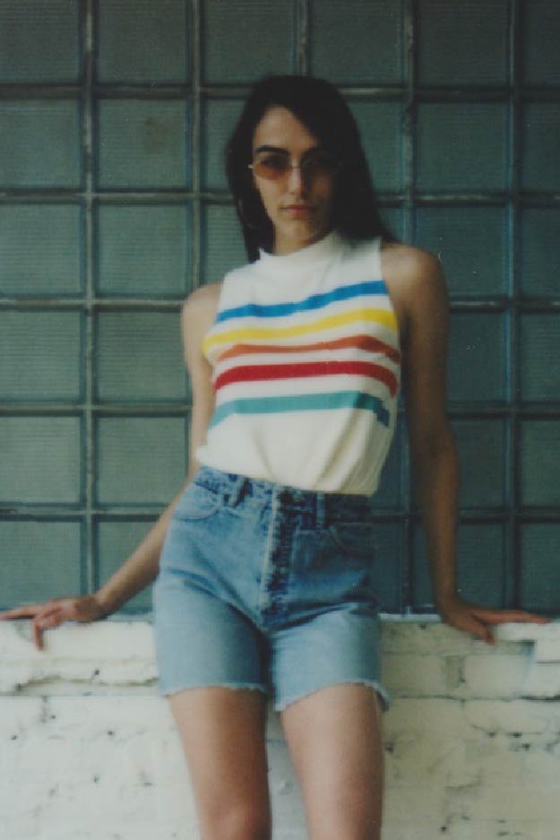 female model wearing vintage denim shorts