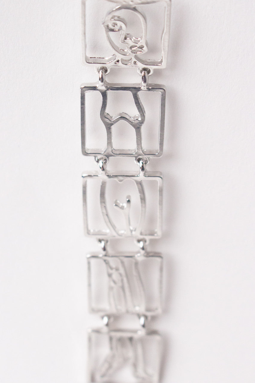 Figure Dangle Earrings
