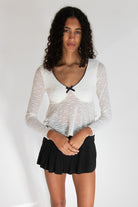 Curved Hem Lace Long Sleeve Bow Top