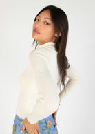 Egret Ribbed Mock Neck Cut Out Sweater