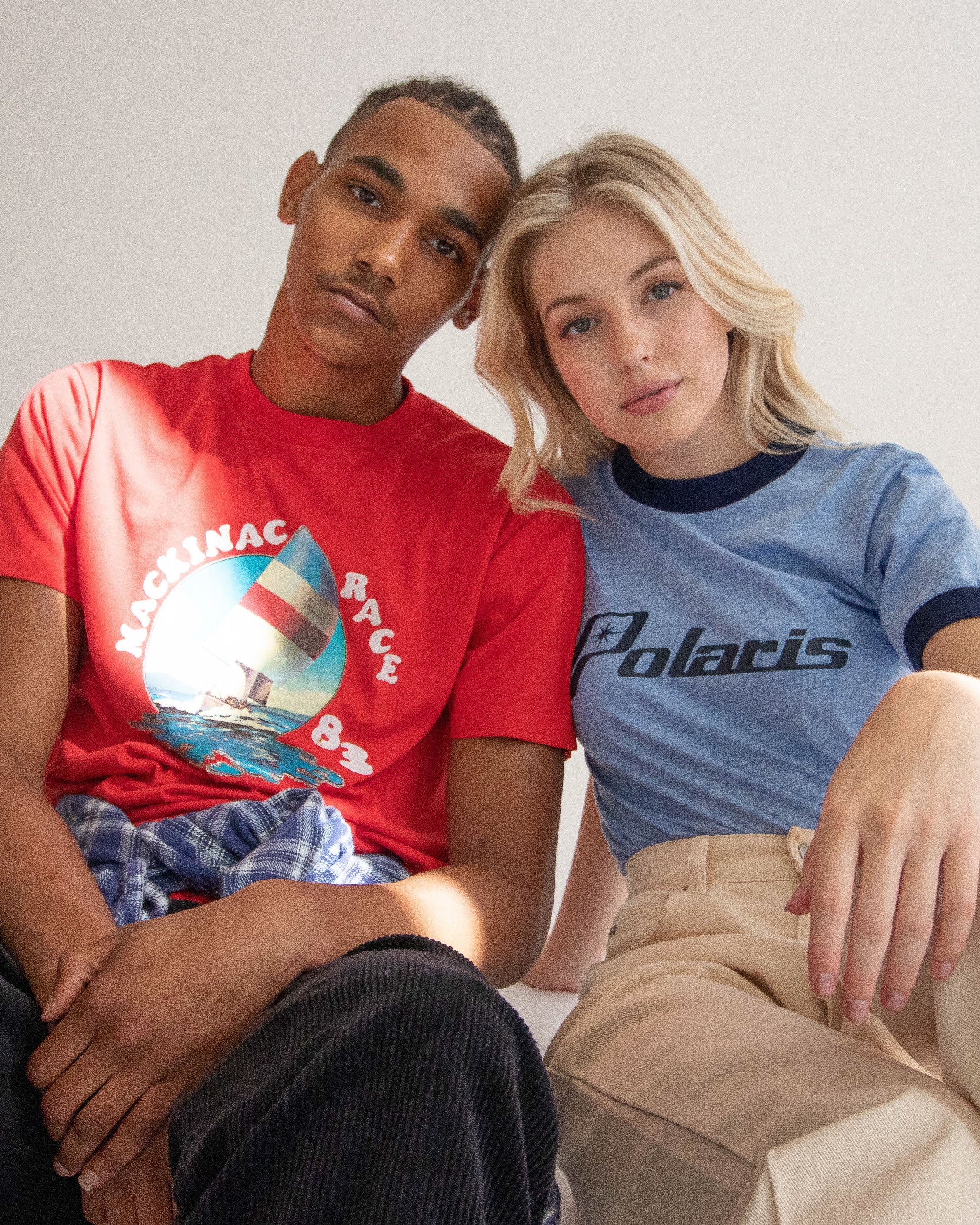 two models wearing the vintage graphic t-shirts