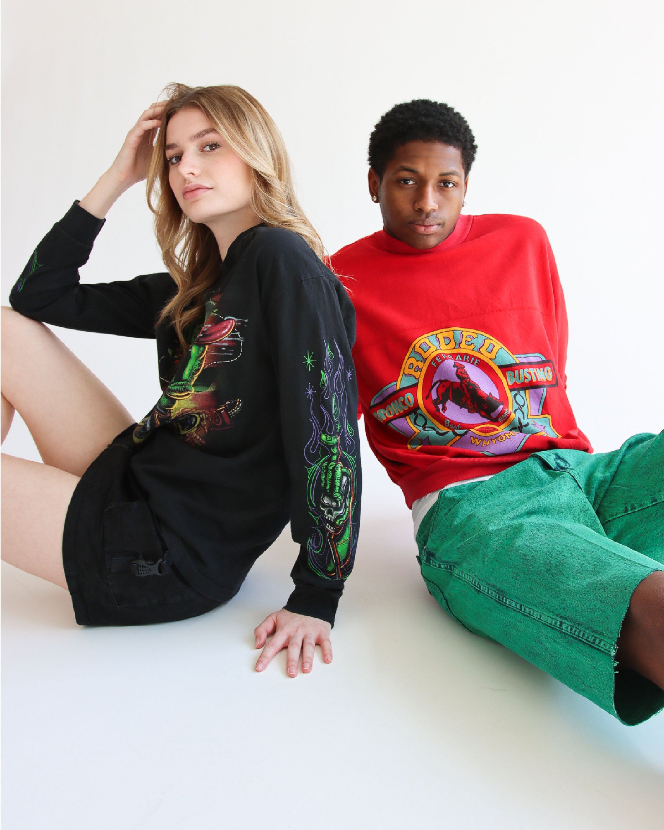 male and female models wearing vintage sweatshirts