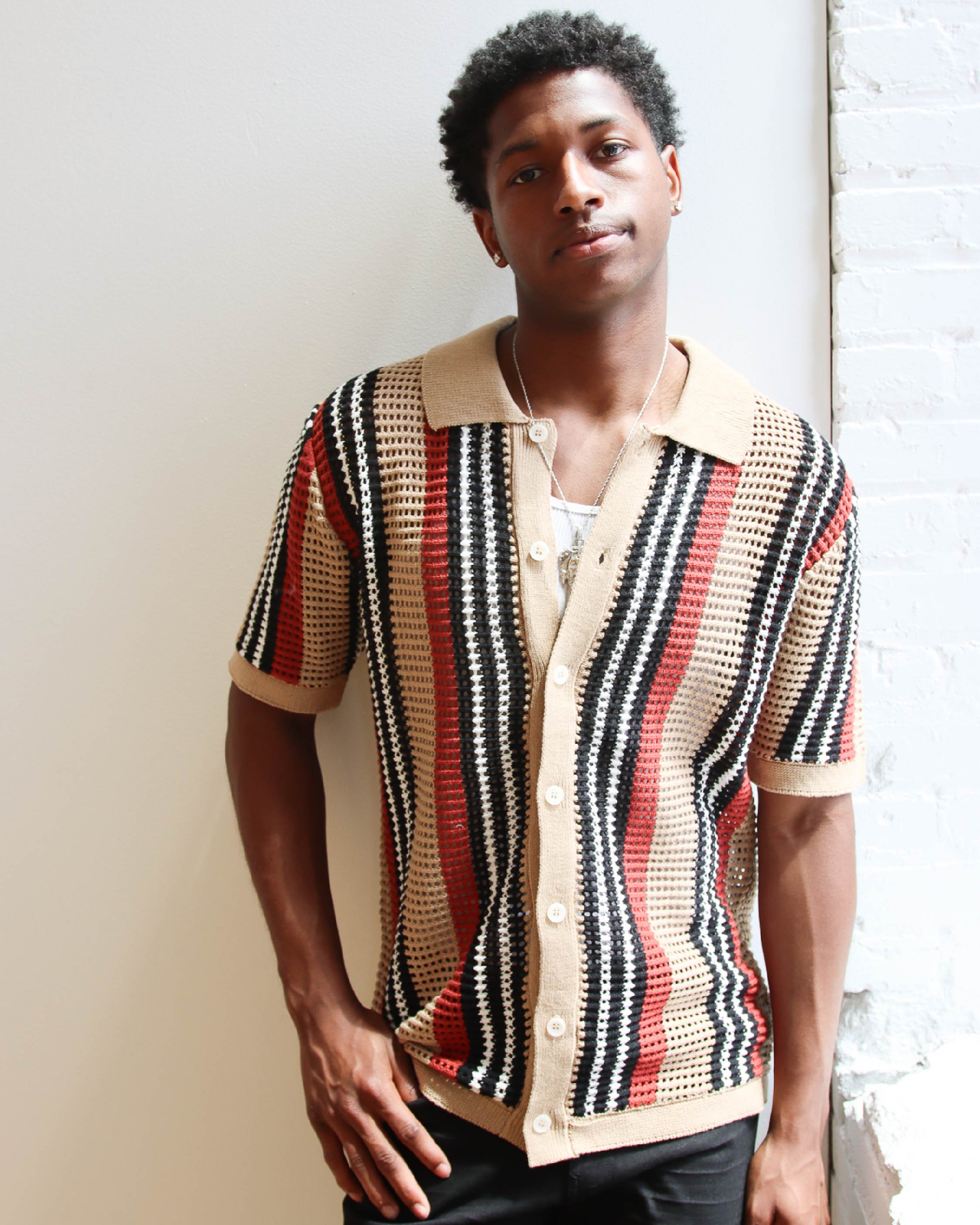 male model wearing crochet button up shirt
