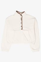 Cream cropped fleece pullover with brown snap-button high neck and front pouch pocket