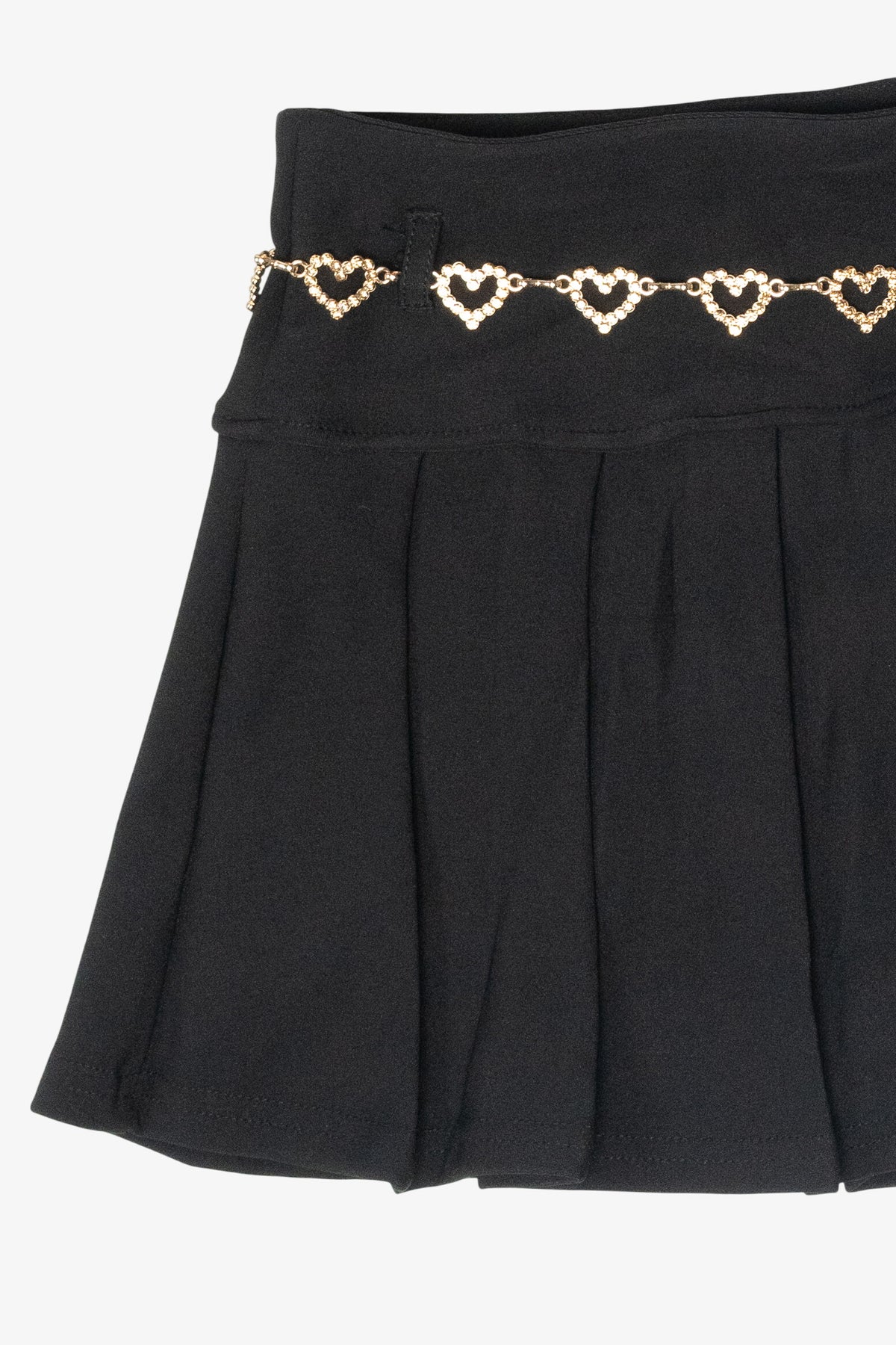 Black pleated mini skirt with a gold rhinestone heart chain belt detail