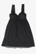 Black sleeveless mesh babydoll dress with ruched sweetheart neckline and empire waist