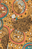 Decorative pattern with animals and geometric shapes on a yellow background