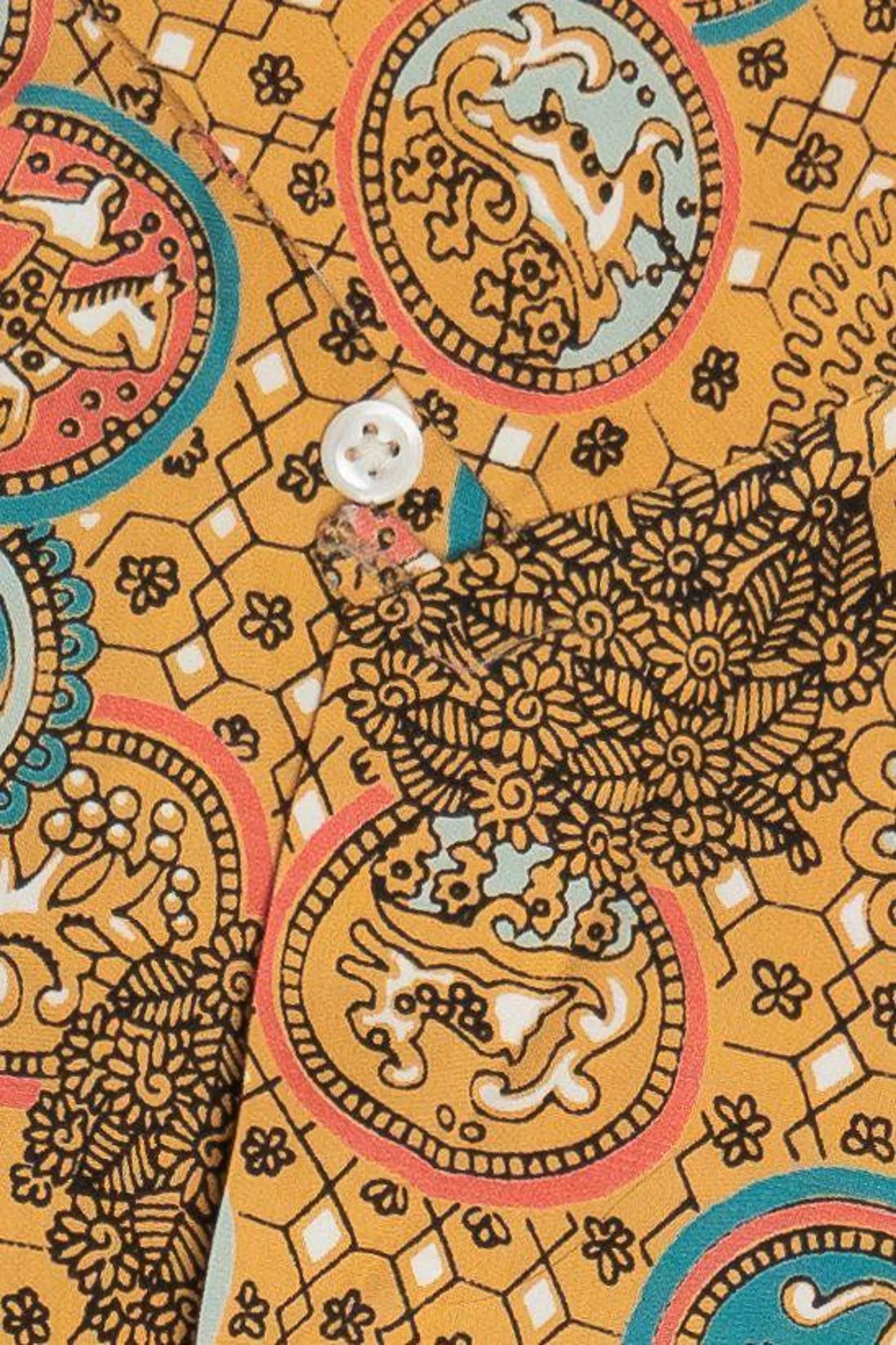Decorative pattern with animals and geometric shapes on a yellow background