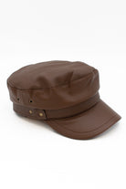 Brown textured leather fisherman cap with curved brim and side rivets