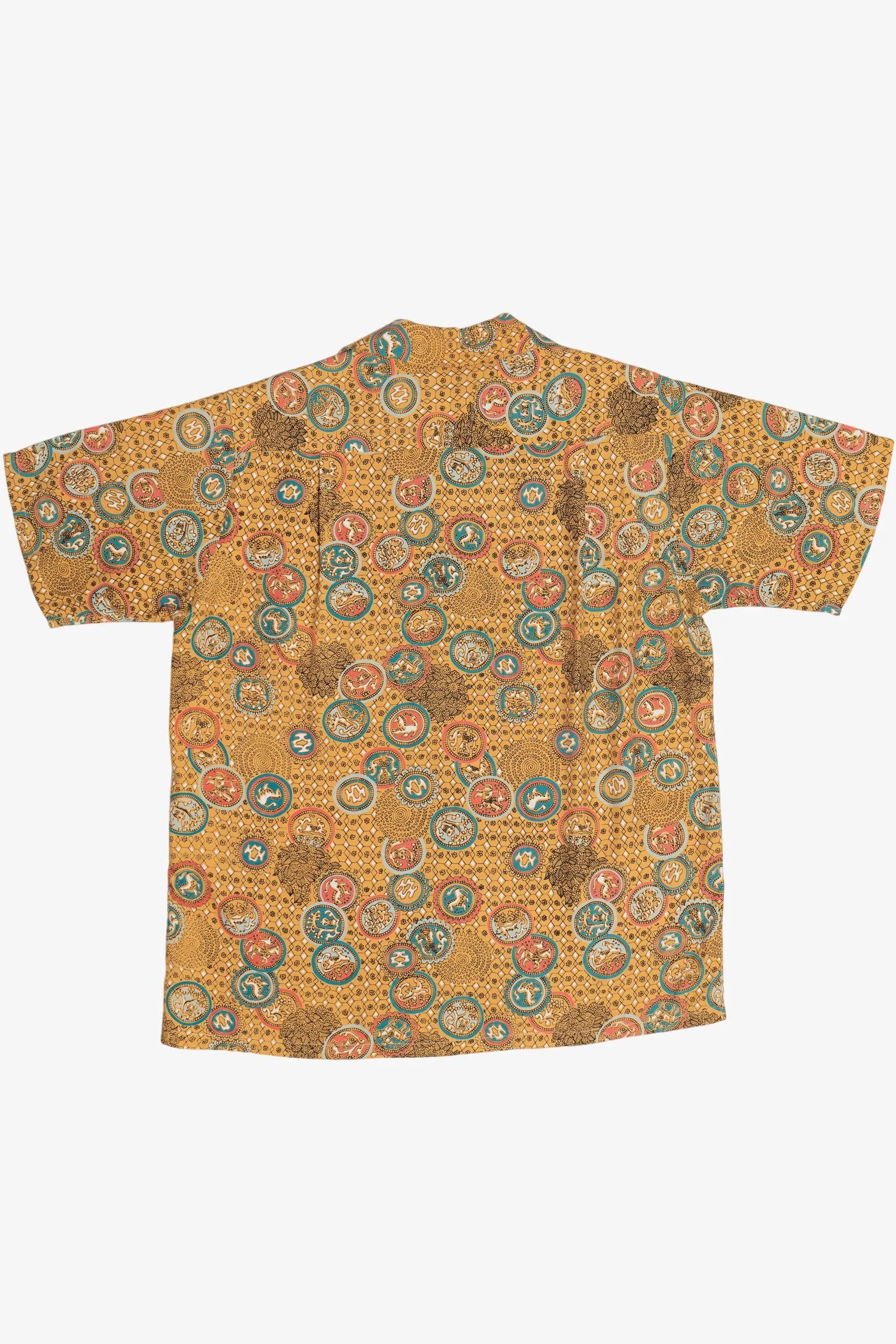 Yellow patterned shirt on a white background