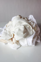 Piled assortment of mixed ganzi fabric wiping cloths