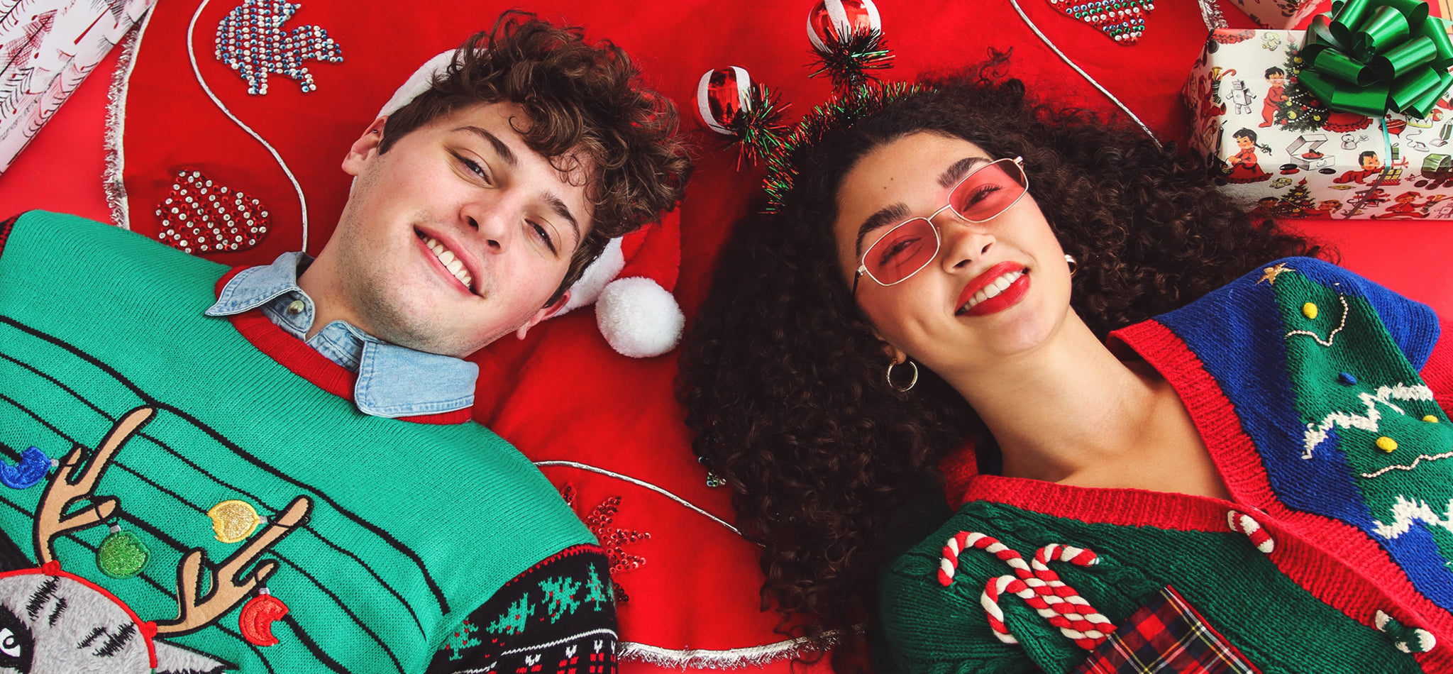 two models wearing new and vintage christmas fashion