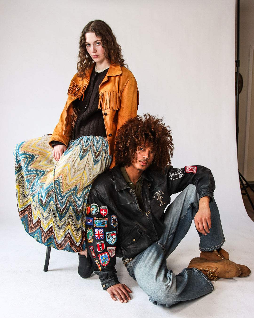 Male and Female modeling vintage clothes at Ragstock