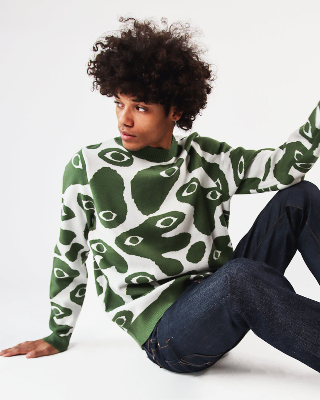 model wearing green amoeba sweater