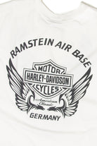 Close-up of white sleeveless Harley-Davidson T-shirt with black Ramstein Air Base Germany logo and wing design