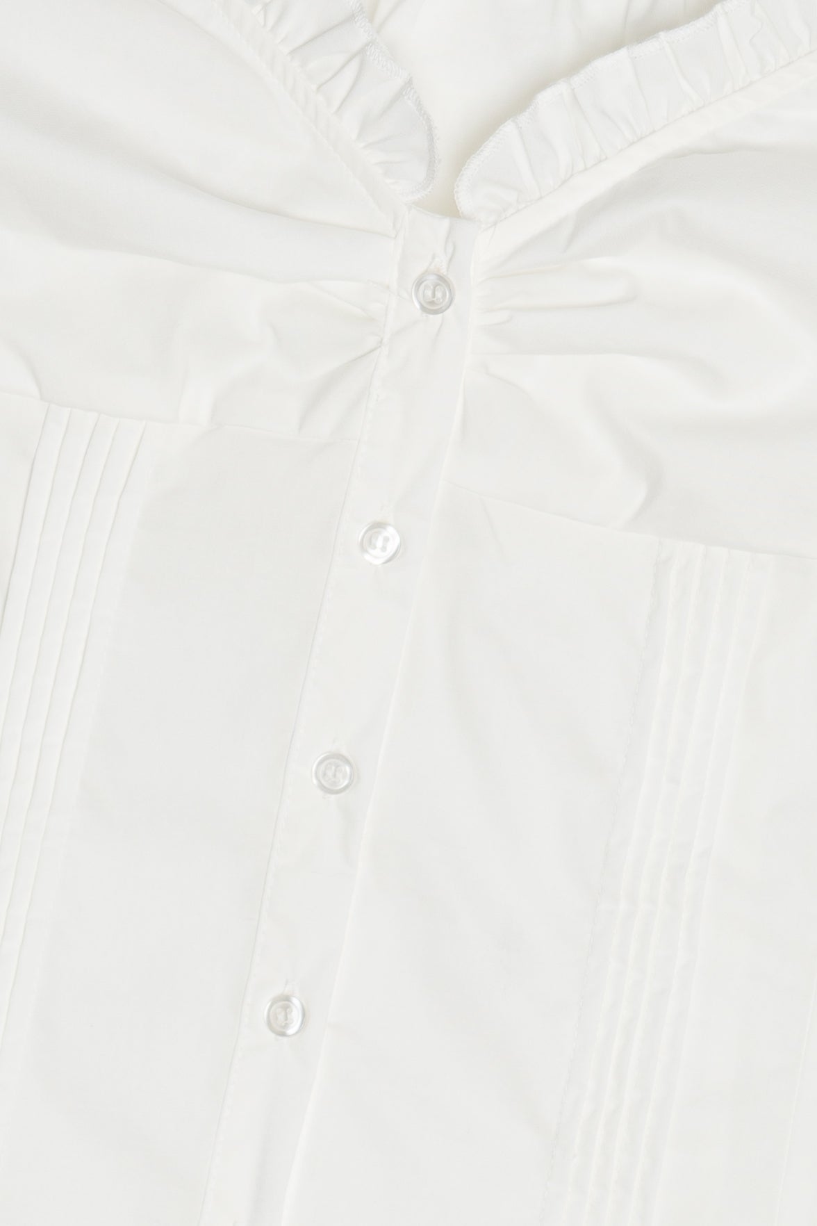 White Pin Tuck Ruffle Top