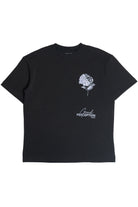 Black t-shirt with white floral design and text on a white background