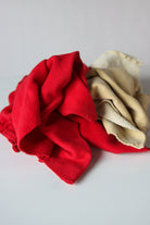 Piled assortment of mixed sweatshirt fleece fabric wiping cloths