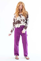 Distressed Cow Print Sweater