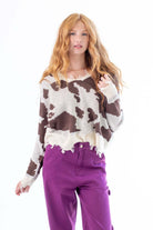 Distressed Cow Print Sweater
