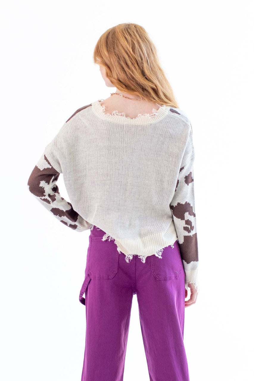 Distressed Cow Print Sweater