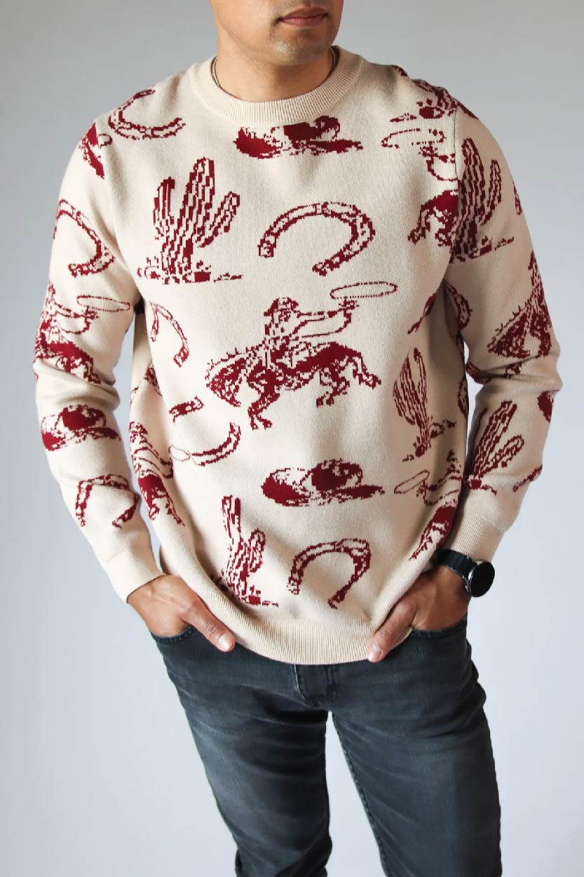 male model in wild west printed sweater