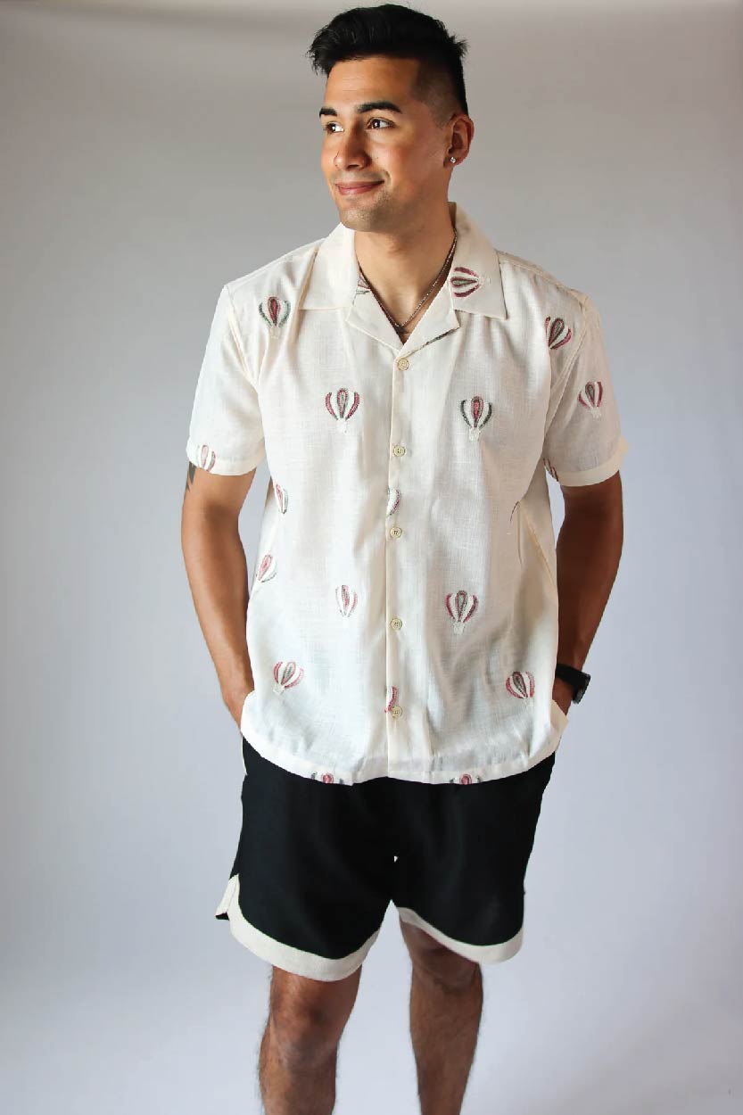 male model wearing hot air balloon embroidered button-up
